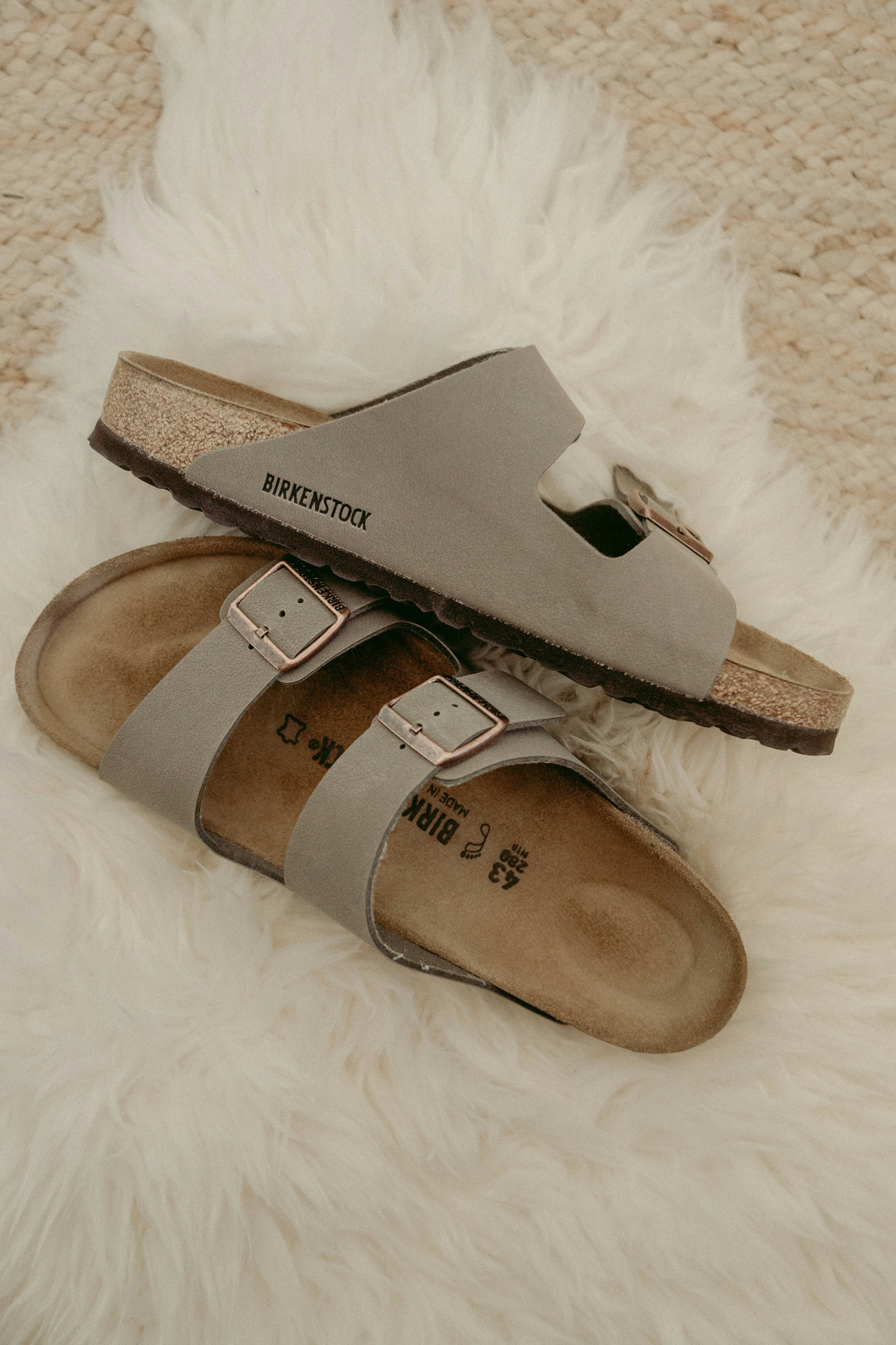 A pair of Birkenstock in the sand